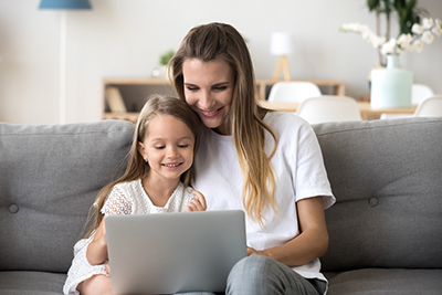 A parent and child placing an order together